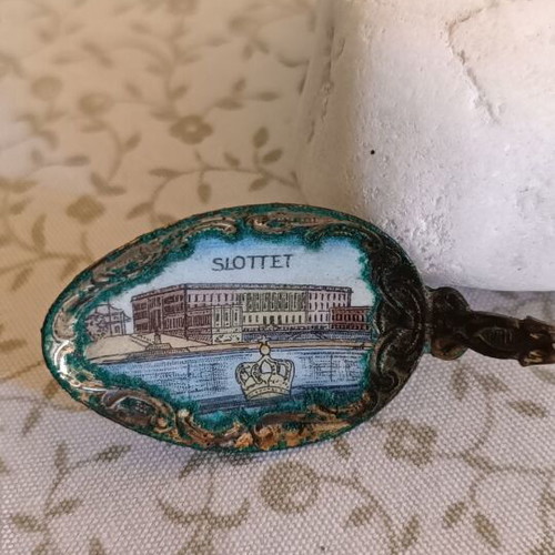Vintage souvenir spoon from Stockholm with enamel decoration