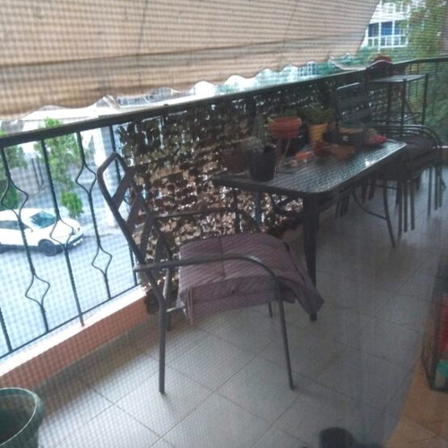 Outdoor dining set used with glass table and 4 chairs