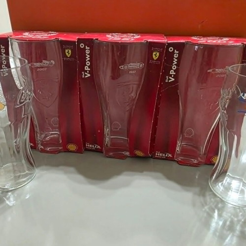 Set of 5 large collectible Ferrari and Athens 2004 glasses