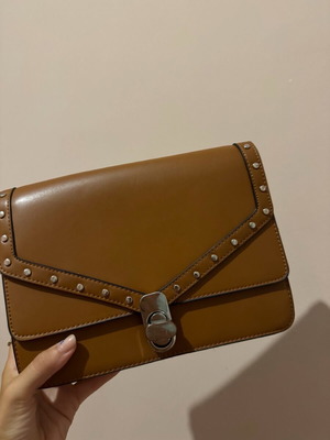 Brown crossbody bag with silver details like new
