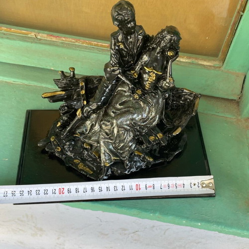 Vintage statue of a loving couple with wooden base like new