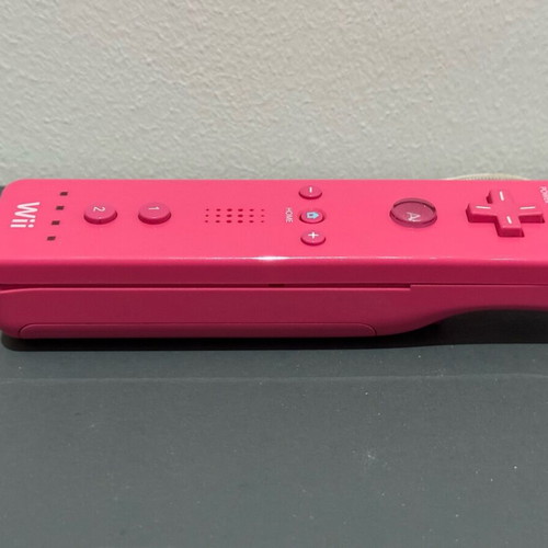 Nintendo Wii controller in pink color like new