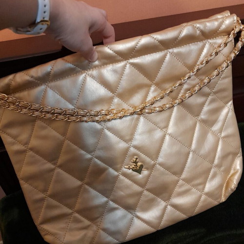 SugarFree shoulder bag like new, quilted gold color