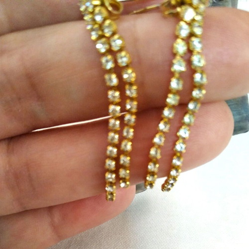 Elegant earrings with rhinestones, like new, gold tone