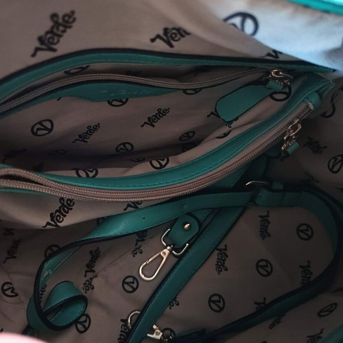 Verde handbag like new, turquoise with urban patterns