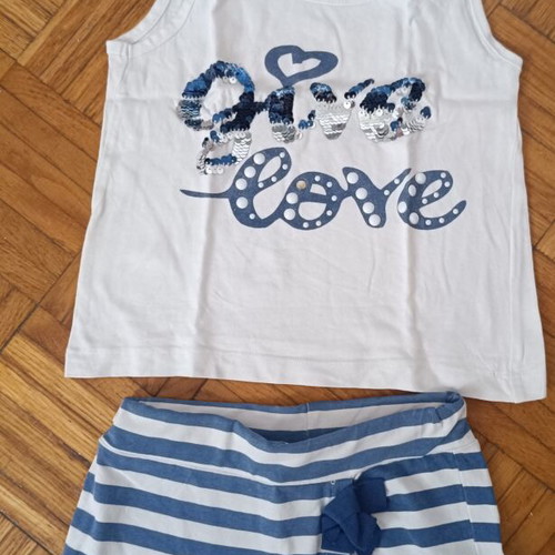New College girls' set with striped skort and sequin bow top, used, size 6