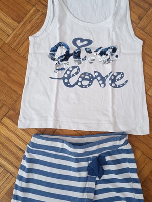 New College girls' set with striped skort and sequin bow top, used, size 6