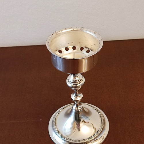Small candlestick like new with glossy metal finish 14cm height