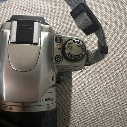 Nikon F65 SLR 35mm camera with AF Nikkor 28-80mm lens and Delsey case
