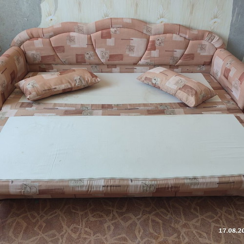 Practical extendable sofa bed with two storage compartments
