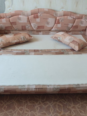 Practical extendable sofa bed with two storage compartments