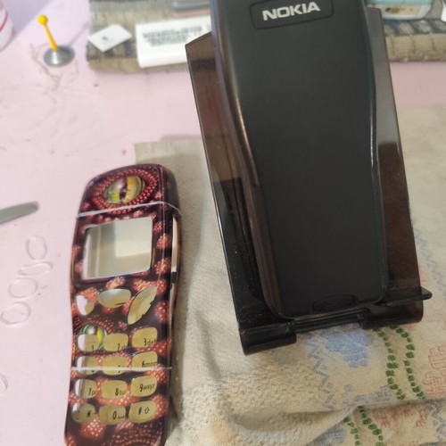 Nokia 3210 vintage cell phone used with new battery and front cover