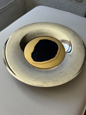 Decorative silver-plated platter used with gold design and blue mineral stone
