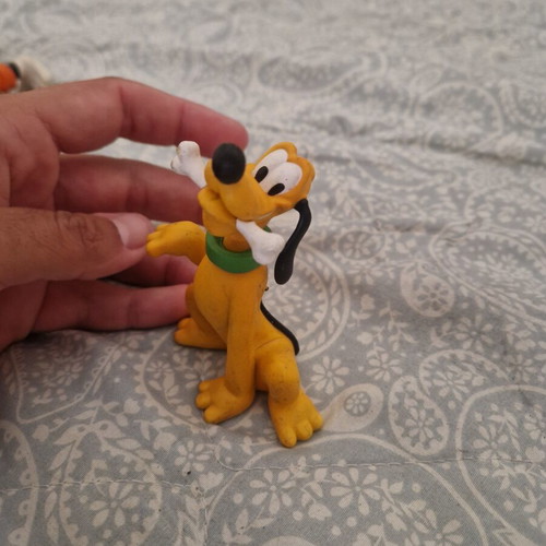 Pluto figure used with one broken ear