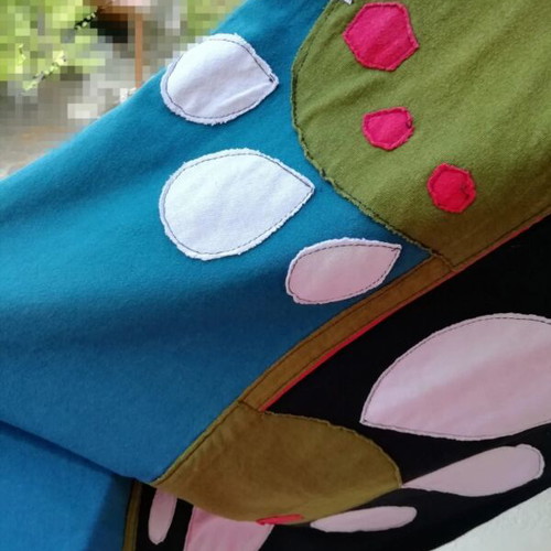 Platinum dress with appliqué designs like new, colorful