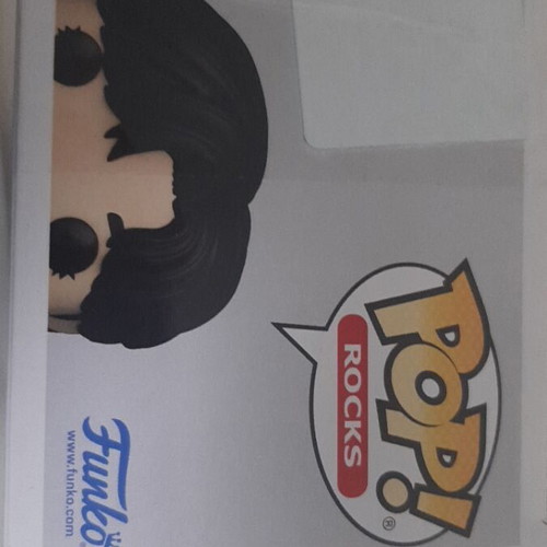 Funko Pop Rocks BTS V vinyl figure like new