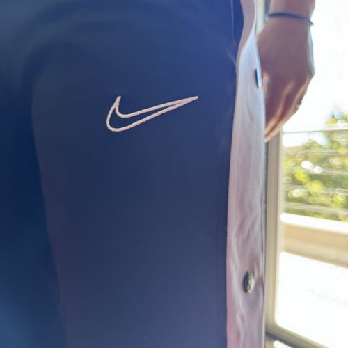 Nike tracksuit with side buttons like new, black and white