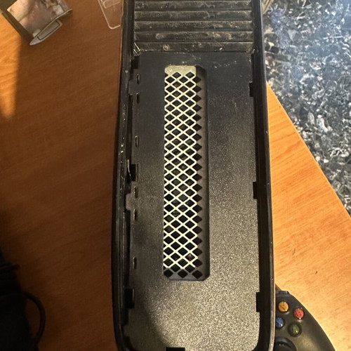 Xbox 360 Slim used with 250GB hard drive and one game