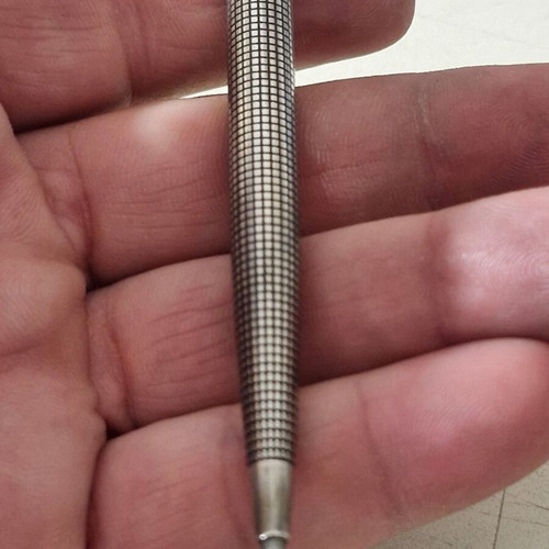 Parker pen in like new condition, possibly silver or silver-plated