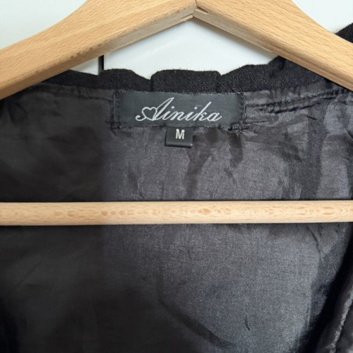 Black Sleeveless Coat size M used with minor wear