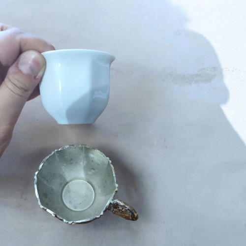 Porcelain coffee cups with silver bases like new
