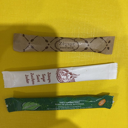 Sugar packet collection, 69 in holders plus 5 loose