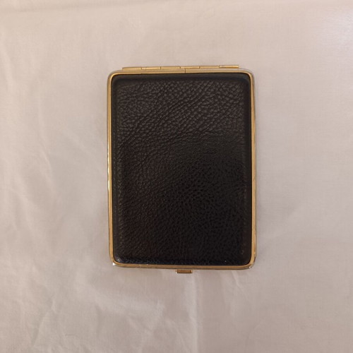 Classic cigarette case used, black leatherette with bronze interior