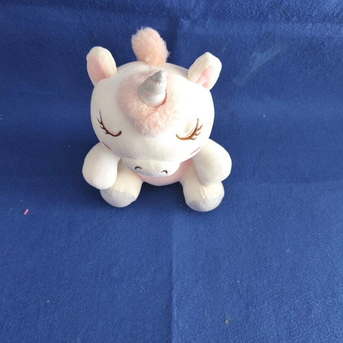 Small plush unicorn, pink and white