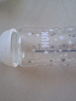Baby bottle like new, feeding spoon and water training bottles