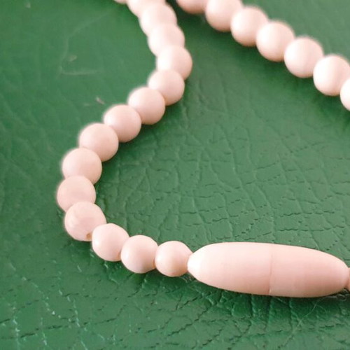 Vintage carved bone necklace with rose details