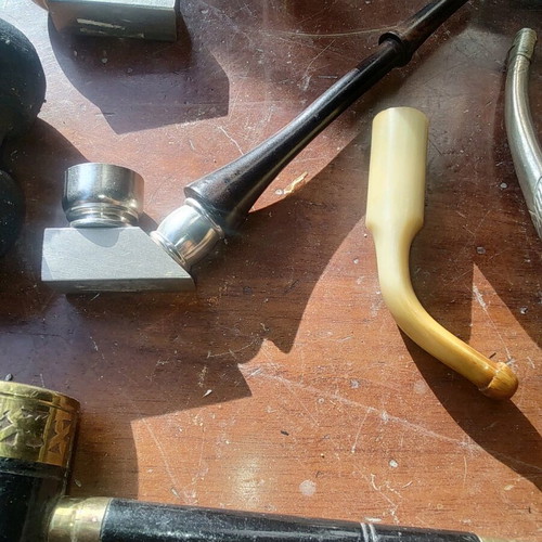Collection of pipes and antiques like new