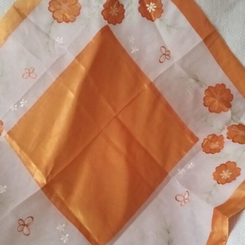 Table linens like new, set with orange, beige and champagne cloths
