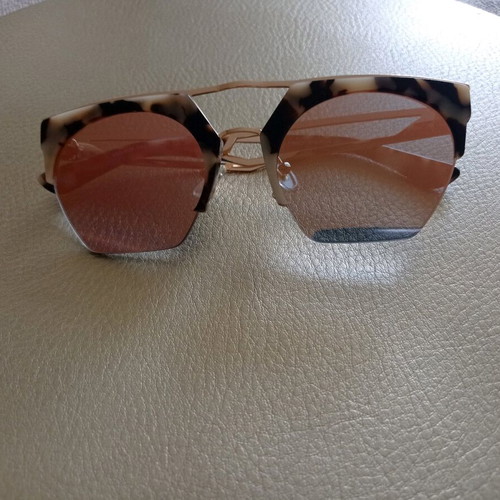 Med sunglasses used with metal and acetate frame, pink gold lenses