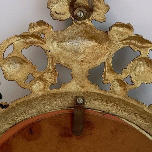 Oval bronze mirror used, antique style with gold paint