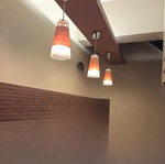 Wall-mounted bar set like new with stools and wooden surface