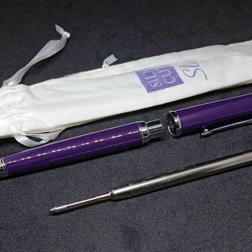 Silk Cut pack used with pen, matches and lighter