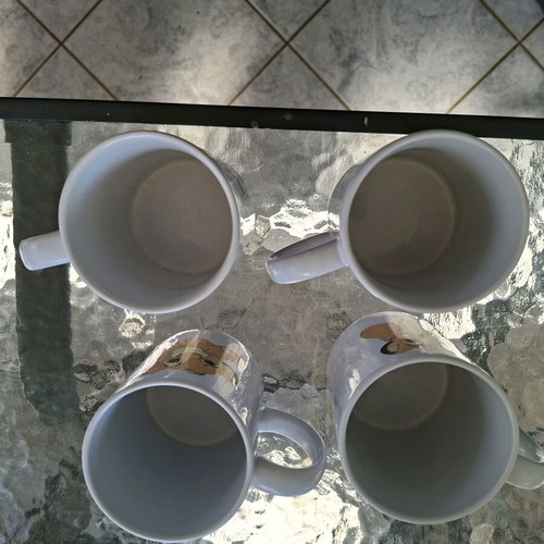 Ceramic mugs like new, pack of 4 with various designs