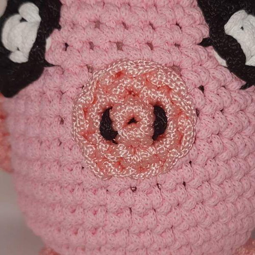 Handmade crocheted doll faces new, piglet