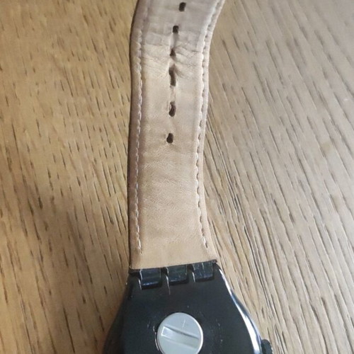 Swatch Black Nachtigall wristwatch YWB403, black dial with rose gold accents