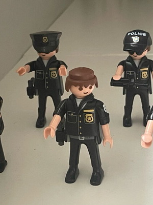 Playmobil vintage police figures with black uniform used