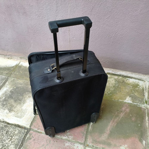 Wheeled suitcase used black