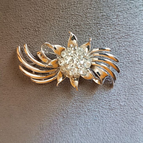 Women's flower brooch with white stones like new