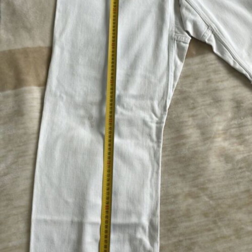Martial arts pants used with white and yellow belt for adults