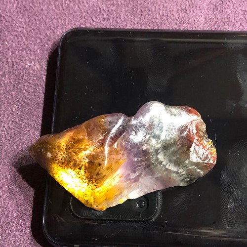 Auralite 23 natural authentic stone with colorful patterns