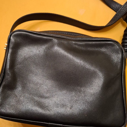 Shoulder bag black genuine leather like new with elephant detail