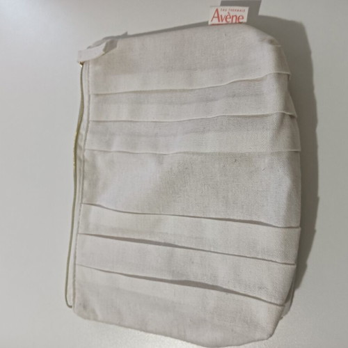 Avene toiletry bag like new, white beige