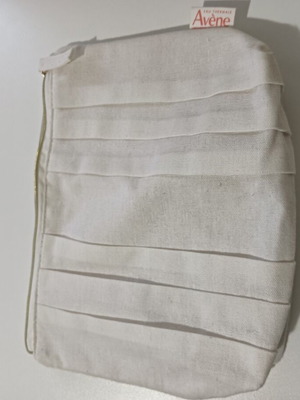 Avene toiletry bag like new, white beige