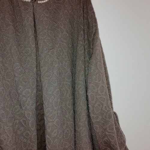 Women's outerwear with embossed design like new