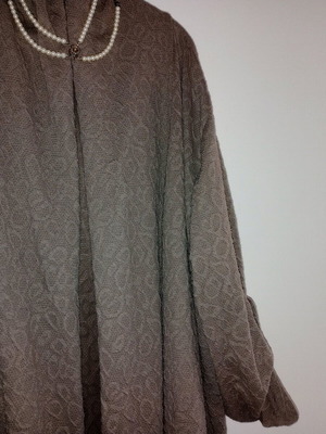 Women's outerwear with embossed design like new