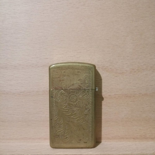 Zippo brass lighter used with engraved design